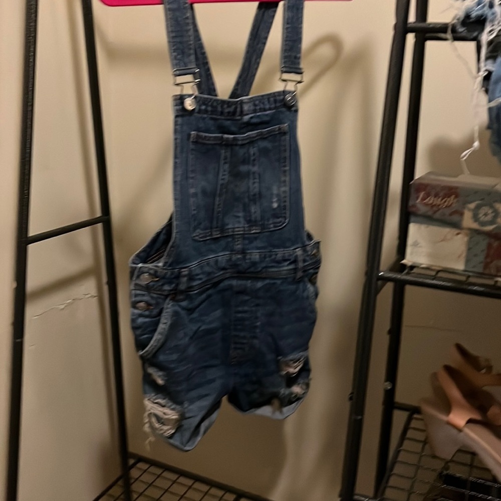 Denim overalls shorts. Distressed.